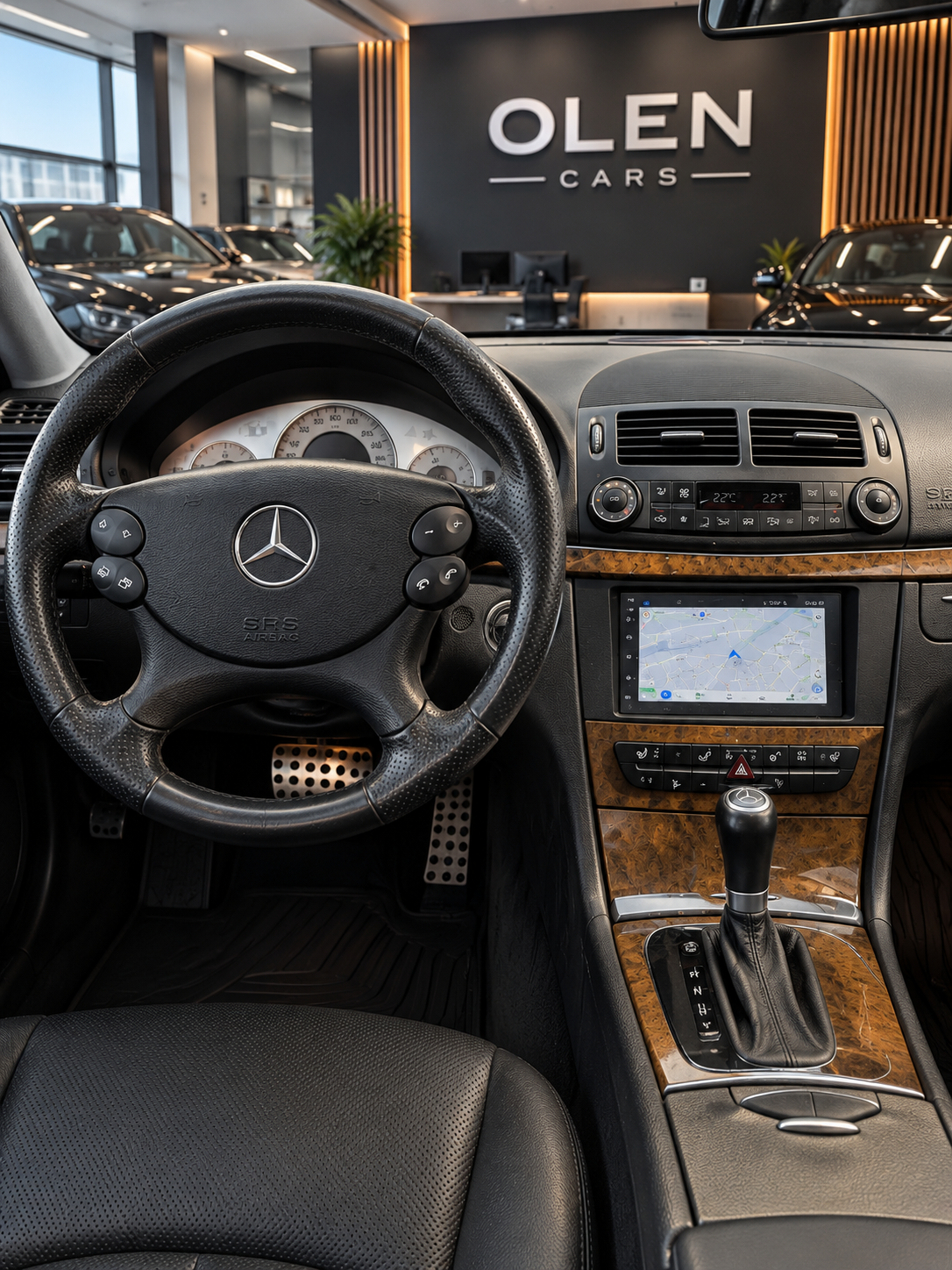 Mercedes-Benz E-Class W211 interior with dashboard, navigation and automatic gear selector